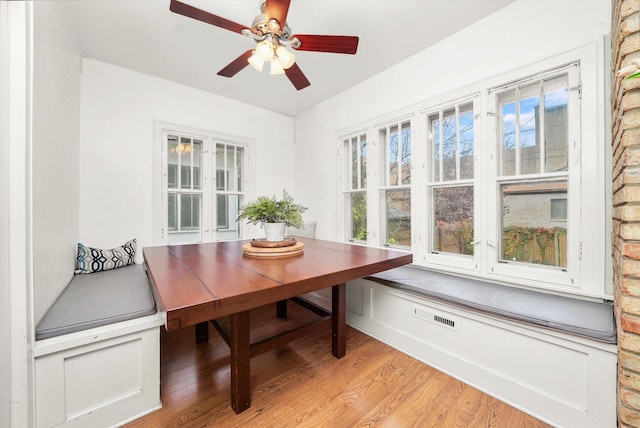 dining room with breakfast area and light wood-type flooring