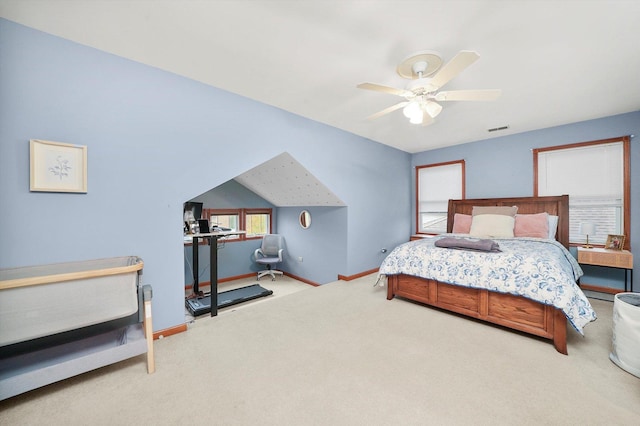 bedroom with lofted ceiling, carpet floors, and ceiling fan