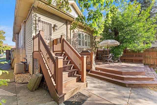 exterior space featuring central AC unit