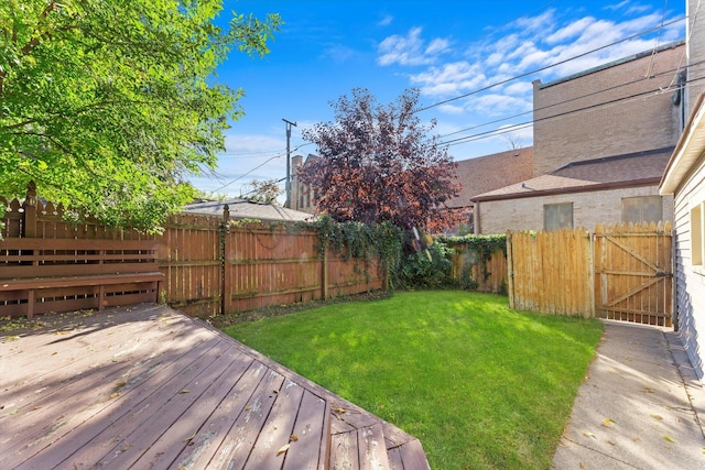 view of yard featuring a wooden deck