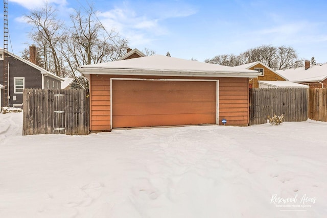 view of snow covered garage