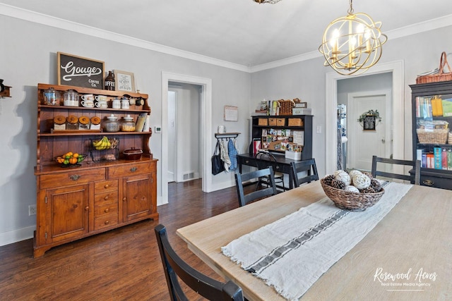 bedroom with dark hardwood / wood-style flooring, ornamental molding, and an inviting chandelier