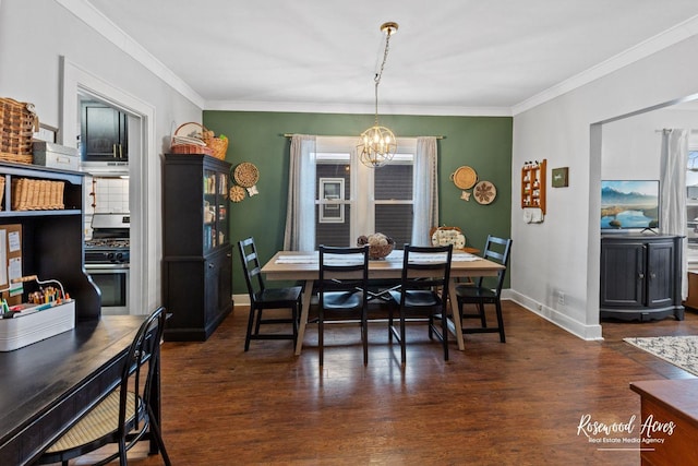 dining space with dark hardwood / wood-style flooring, a chandelier, and ornamental molding