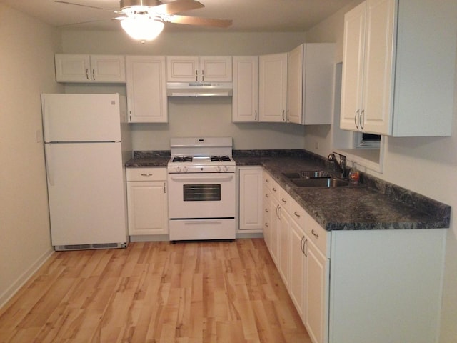 kitchen featuring ceiling fan, sink, white appliances, white cabinets, and light wood-type flooring