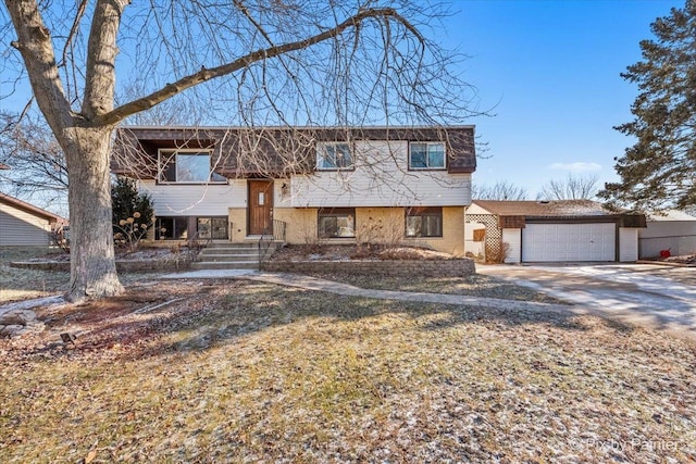 bi-level home featuring a garage