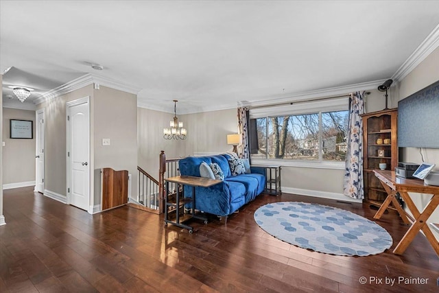 living area featuring ornamental molding, a notable chandelier, and dark wood-type flooring