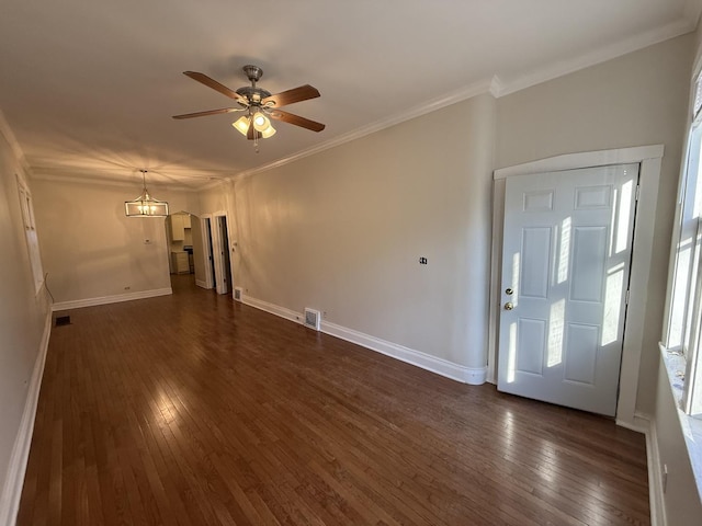 foyer entrance with baseboards, dark wood-style floors, and ornamental molding