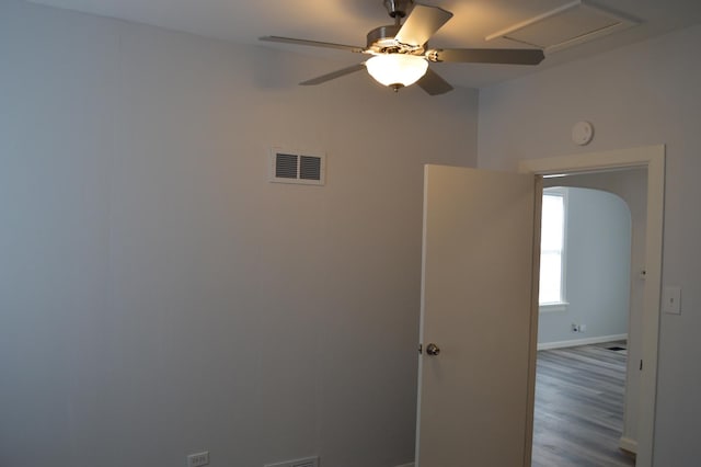 spare room featuring ceiling fan and wood-type flooring