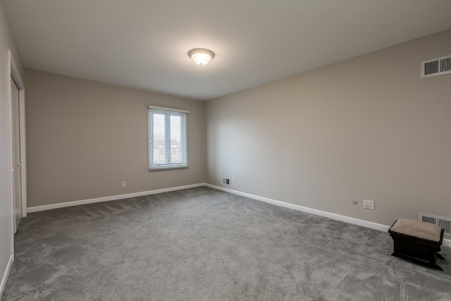 unfurnished bedroom featuring carpet