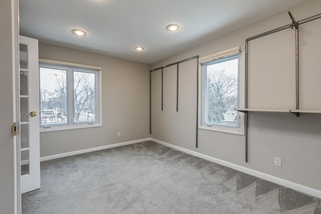 unfurnished bedroom with carpet floors