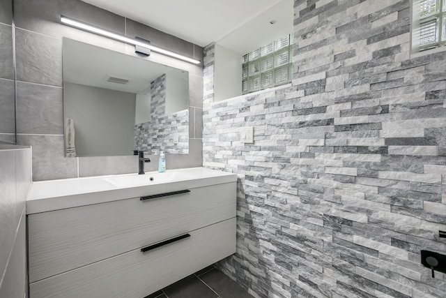 bathroom featuring tile patterned floors and vanity