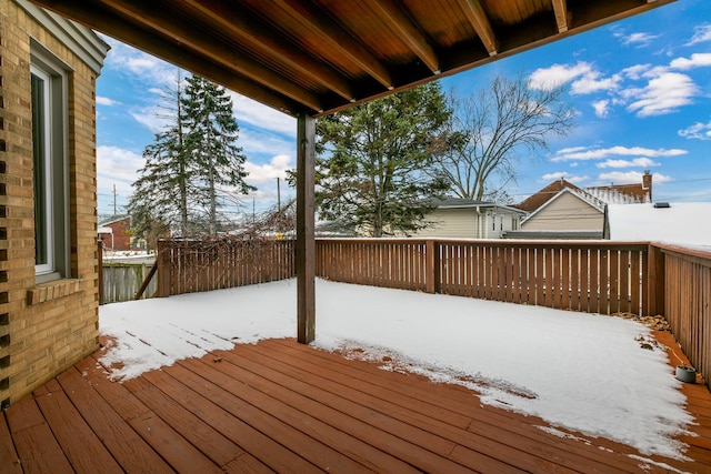 view of snow covered deck