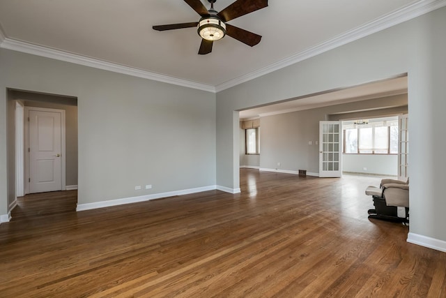 unfurnished living room featuring french doors, crown molding, ceiling fan, and dark wood-type flooring