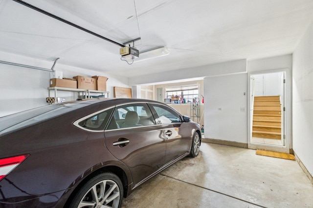 garage featuring a garage door opener