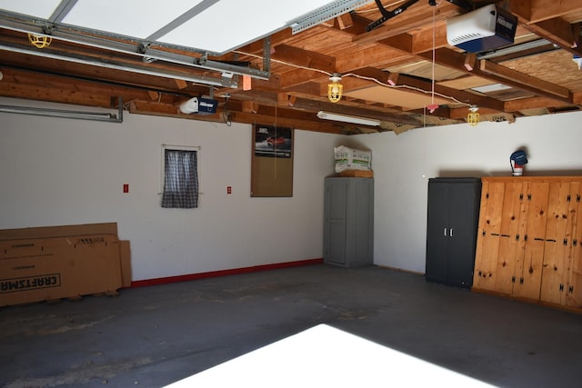 garage featuring a garage door opener