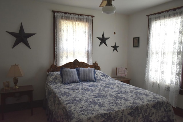 bedroom featuring ceiling fan