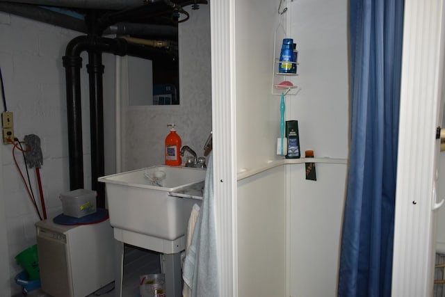 utility room featuring sink