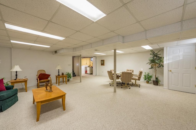 interior space with washer / dryer and a drop ceiling