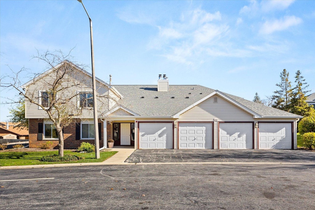 front of property featuring a garage