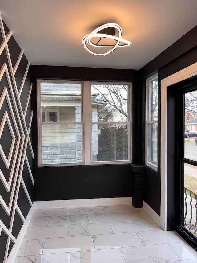 view of unfurnished sunroom