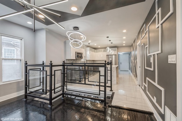 interior space with an inviting chandelier