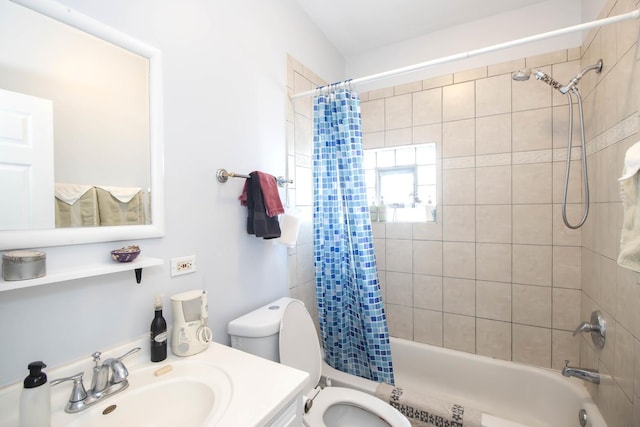 full bathroom with toilet, shower / tub combo, and vanity