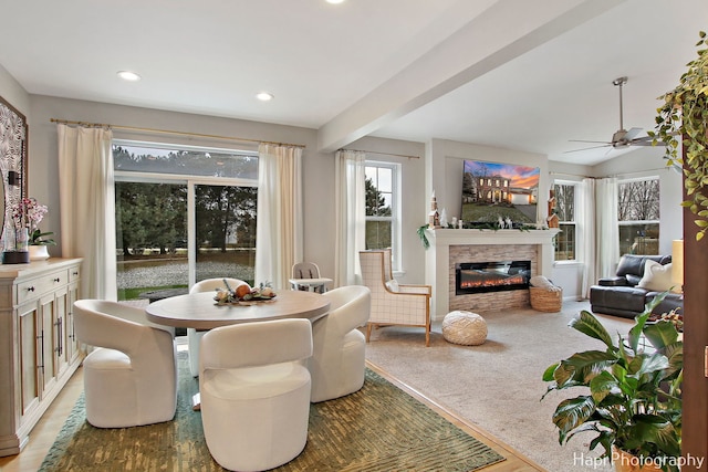 dining space featuring ceiling fan and carpet floors