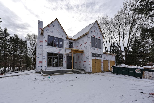 view of snow covered property