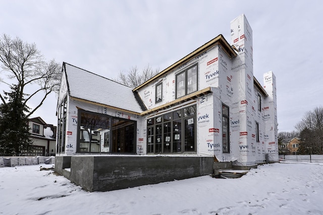 view of snow covered building