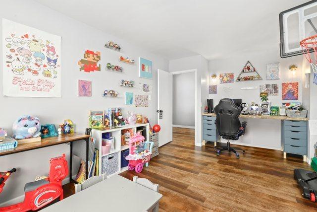 office area with dark hardwood / wood-style flooring