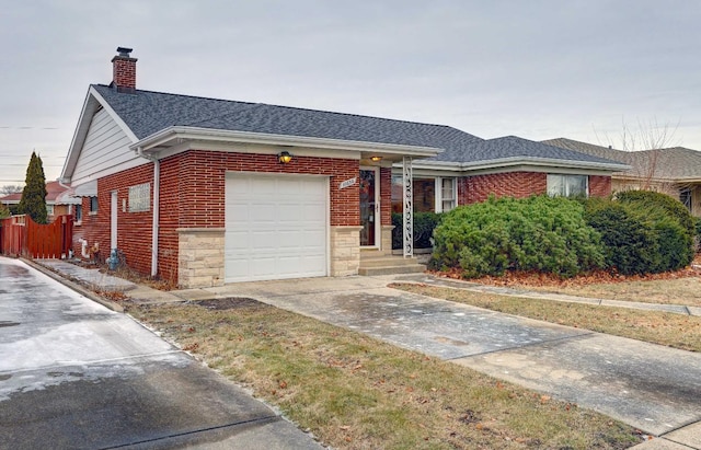 single story home featuring a garage