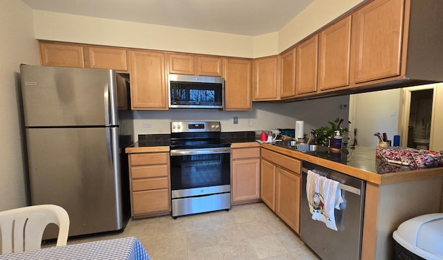 kitchen featuring sink and appliances with stainless steel finishes