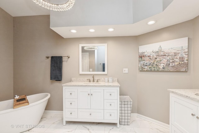 bathroom featuring vanity and a bathing tub