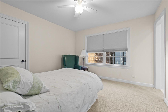 bedroom featuring ceiling fan and carpet floors