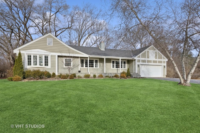 single story home with a garage and a front yard