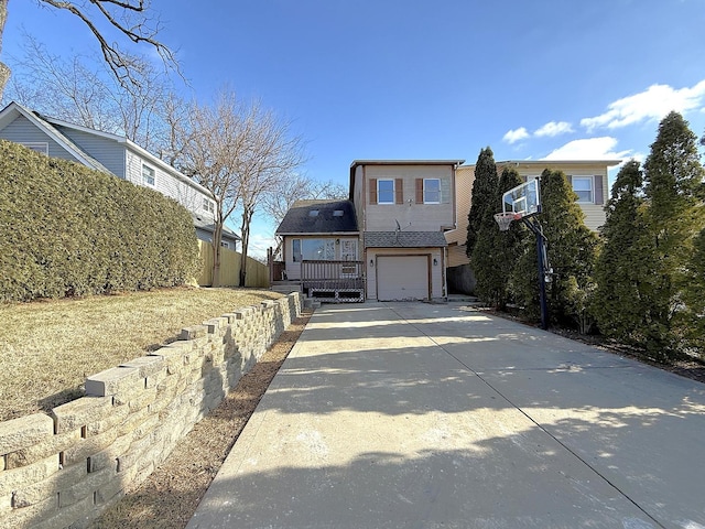 view of side of property featuring a garage