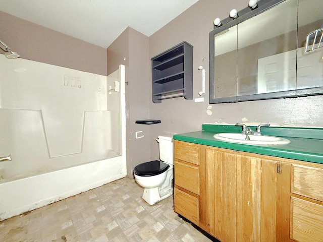 full bathroom with toilet, vanity, and bathtub / shower combination