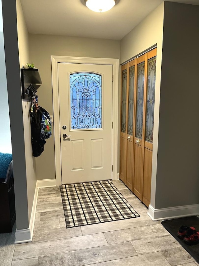 foyer with light hardwood / wood-style flooring