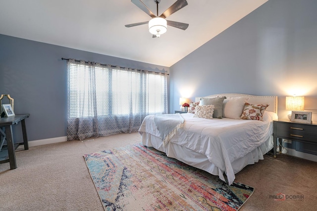 carpeted bedroom featuring vaulted ceiling and ceiling fan