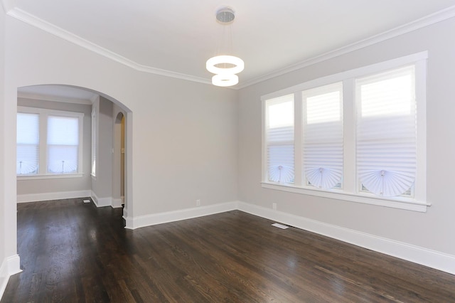 unfurnished room with crown molding and dark hardwood / wood-style floors