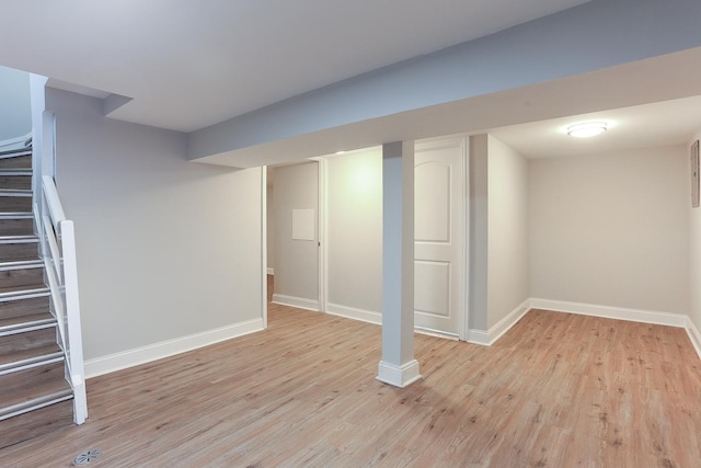 basement with light wood-type flooring