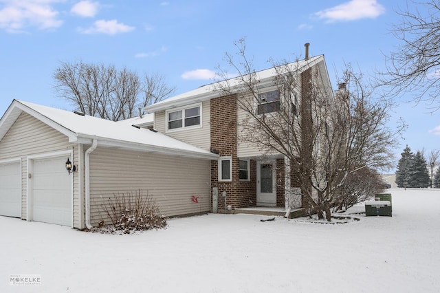 view of front of home with a garage