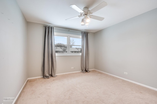 unfurnished room with light carpet and ceiling fan