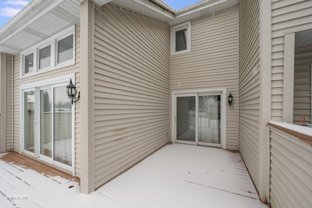 entrance to property with a wooden deck