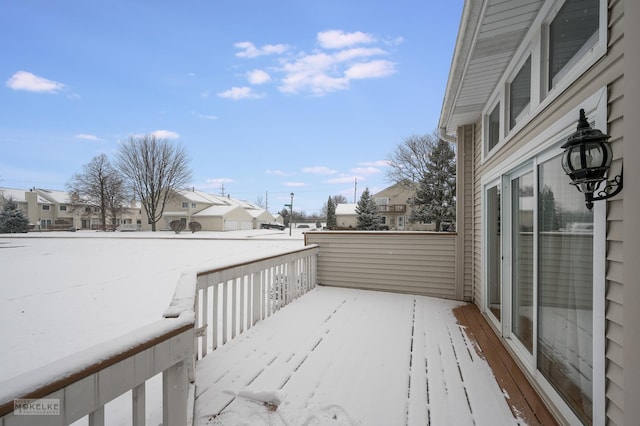 view of snow covered deck