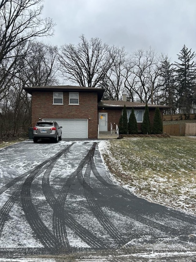 view of front of property featuring a garage