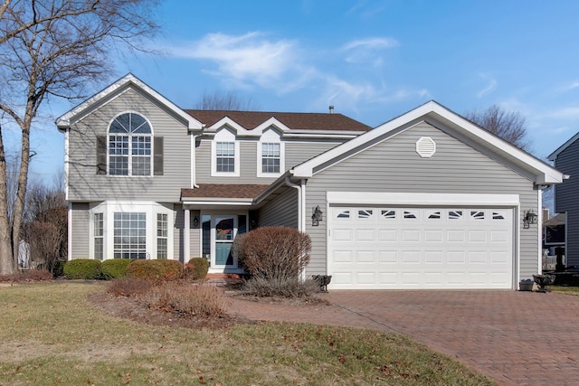 view of front property with a garage