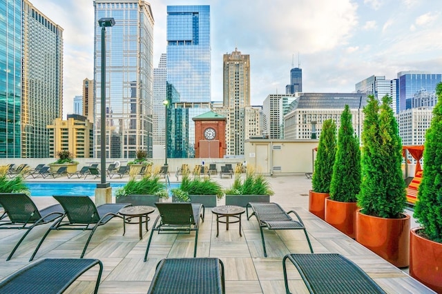 view of patio with a community pool