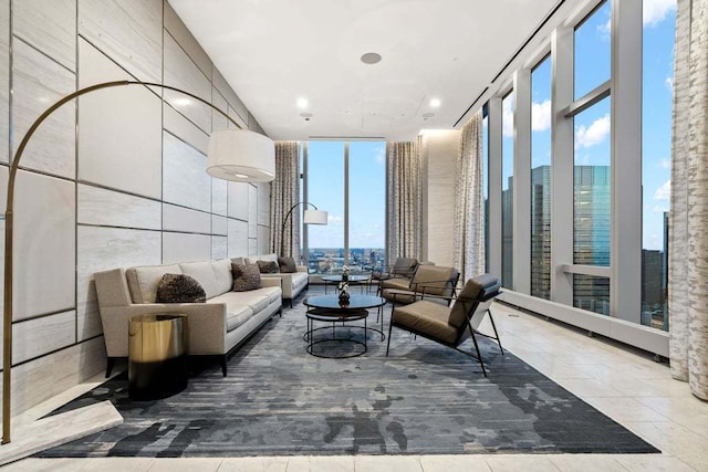 living area with a city view and expansive windows