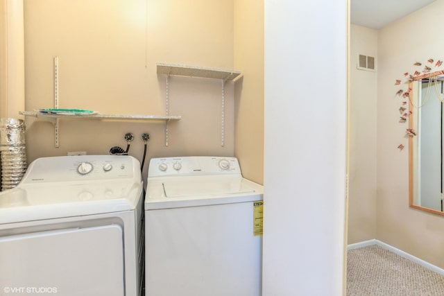 laundry area featuring carpet and washing machine and clothes dryer